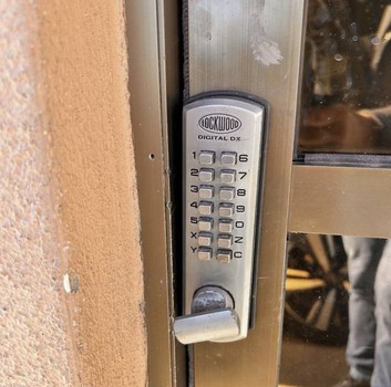 Digital keypad lock installed on a door