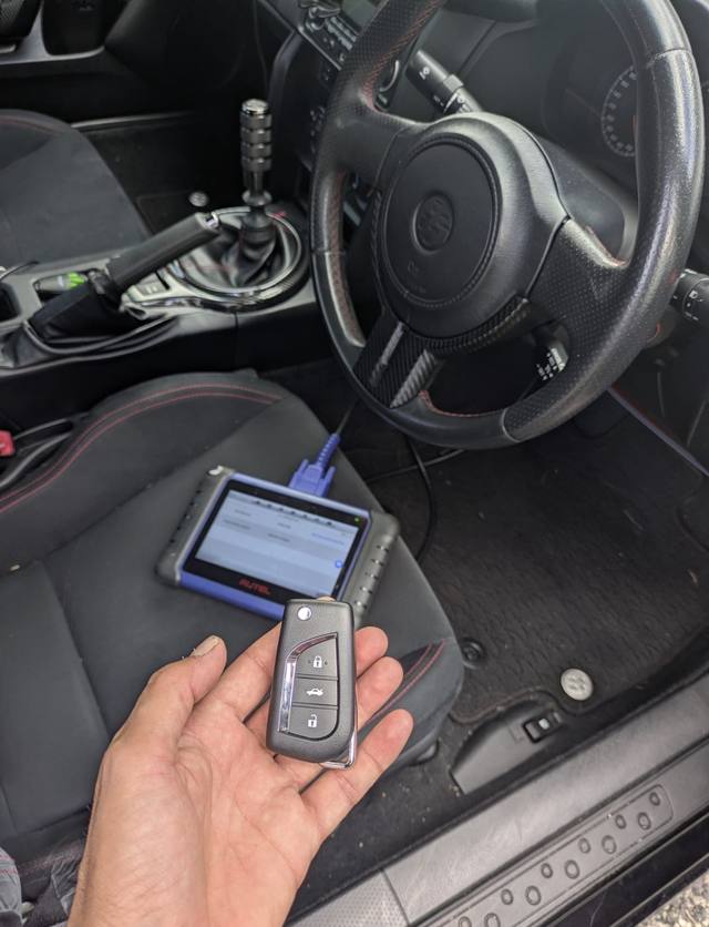 Diagnostic programmer connected inside a Toyota